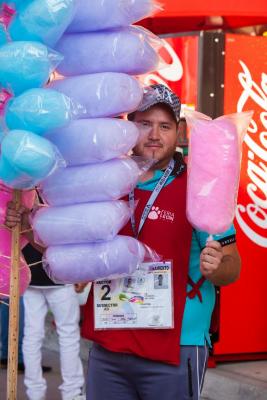 Vendedor de algodón de azúcar “Una vara”
